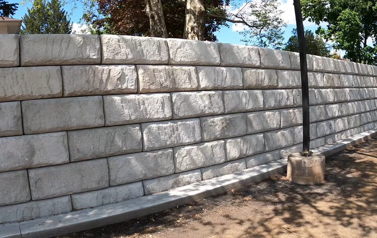 White concrete retaining wall installation in Chico, California