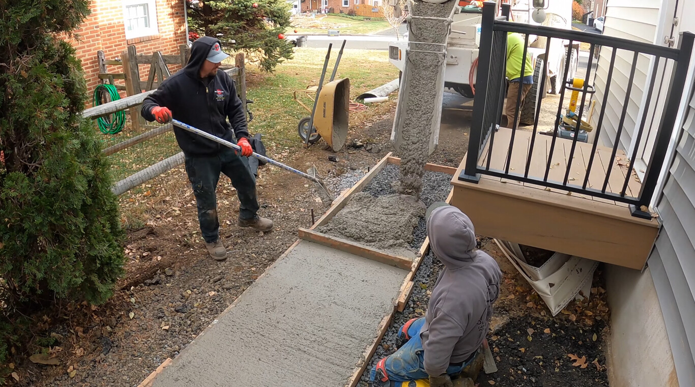 Professional concrete contractor pouring walkway in Chico, California